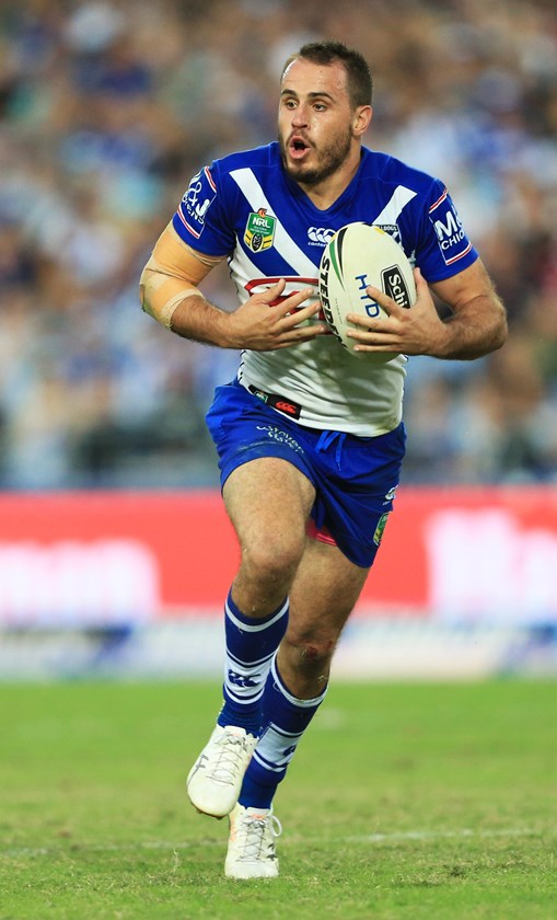 Josh Reynolds leads the Bulldogs to a Good Friday victory over the Rabbitohs in 2017.