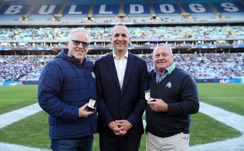 NRL CEO Andrew Abdo formally presented Bulldogs legends, Paul Langmack and Terry Lamb with their specially designed '300 Club' gold rings.