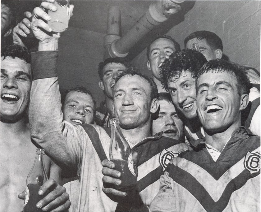 Dragonslayers: Captain Kevin Ryan (centre) celebrates with teammates after their herculean efforts to end St George's 11-year Premiership run in 1967. 